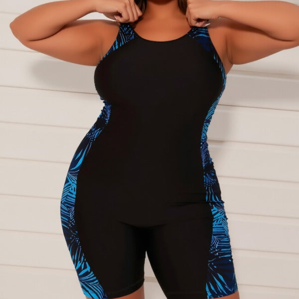 One-piece plus size black swimsuit, slimming and flattering, casual sporty beach vacation swimwear for women.