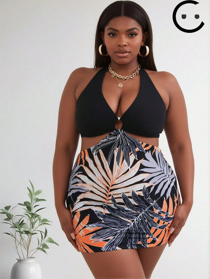 Women's Vibrant Plus Size One-Piece: Black Halter Top with O-Ring and Tropical Palm Leaf Print Skirted Bottom
