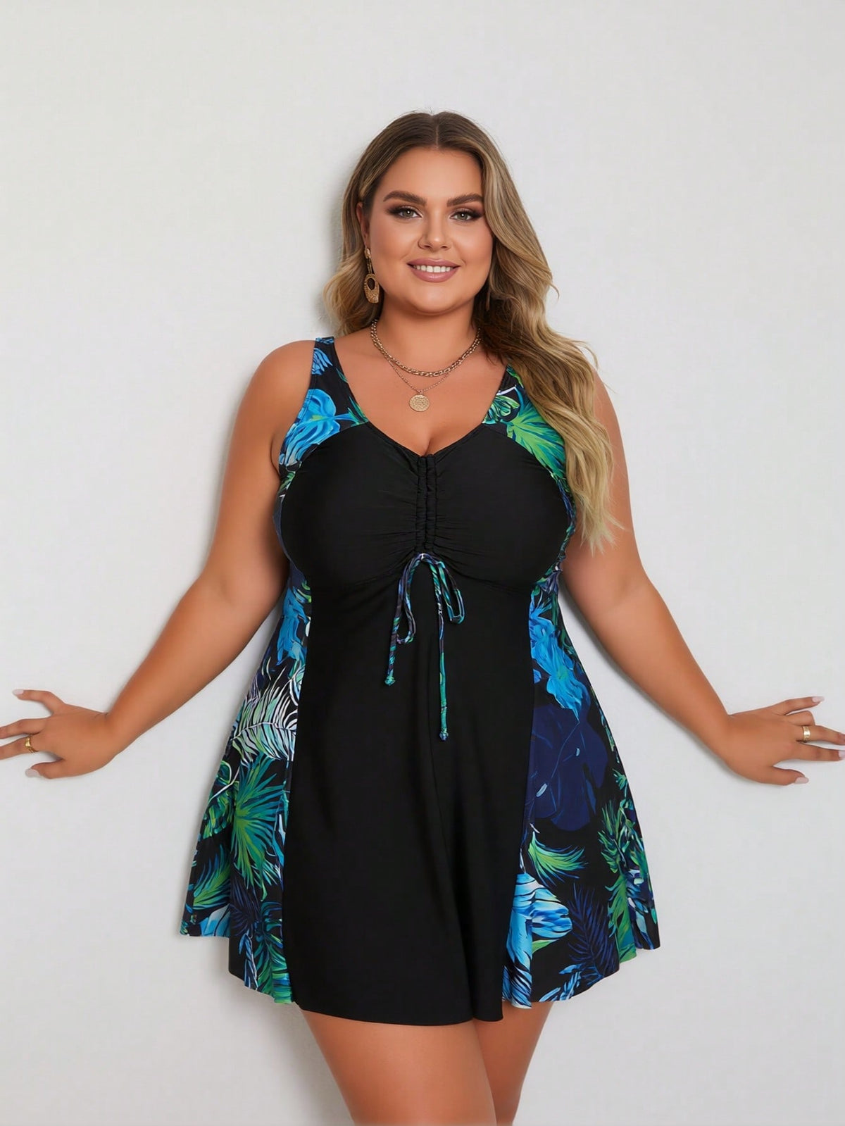 Vacation Style Plus Size Swimdress: Vibrant Tropical Leaf Print On Black Base For A Fresh And Modest Beach Look