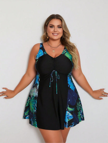 Vacation Style Plus Size Swimdress: Vibrant Tropical Leaf Print On Black Base For A Fresh And Modest Beach Look