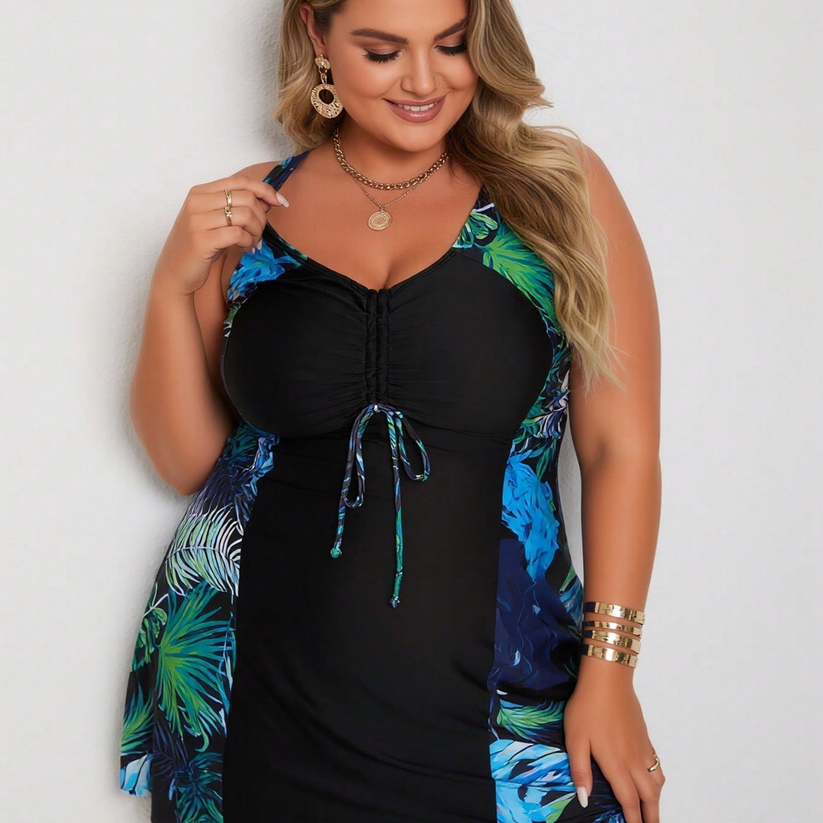 Vacation Style Plus Size Swimdress: Vibrant Tropical Leaf Print On Black Base For A Fresh And Modest Beach Look