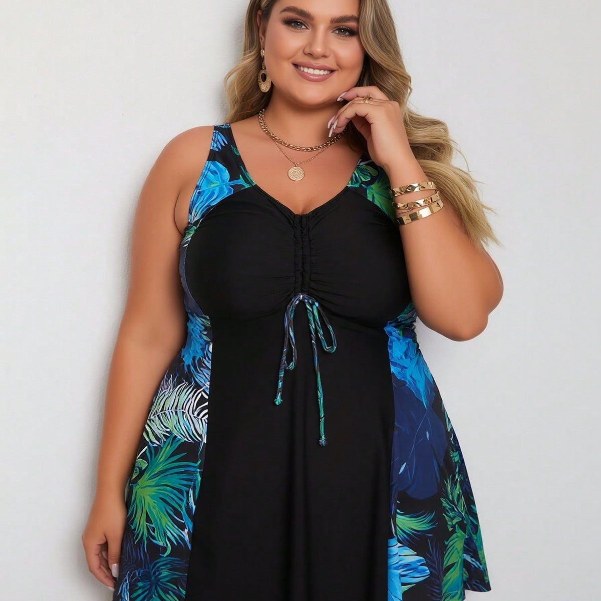 Vacation Style Plus Size Swimdress: Vibrant Tropical Leaf Print On Black Base For A Fresh And Modest Beach Look
