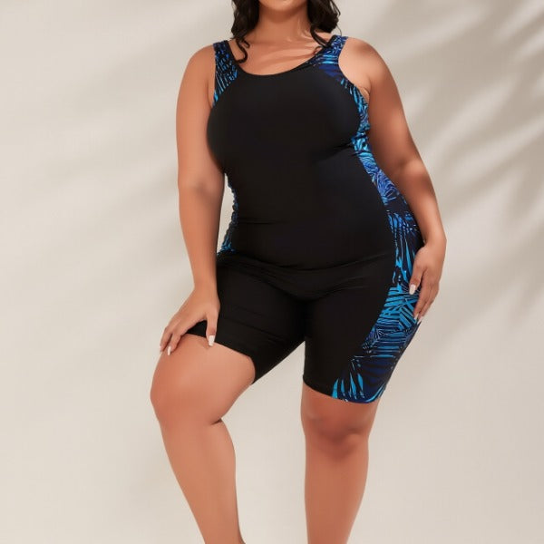 One-piece plus size black swimsuit, slimming and flattering, casual sporty beach vacation swimwear for women.