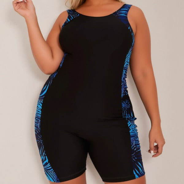 One-piece plus size black swimsuit, slimming and flattering, casual sporty beach vacation swimwear for women.